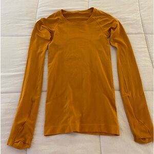 Lululemon Orange swiftly tech shirt
